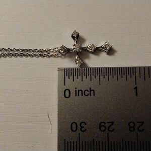Sterling silver w/ cross pendant.